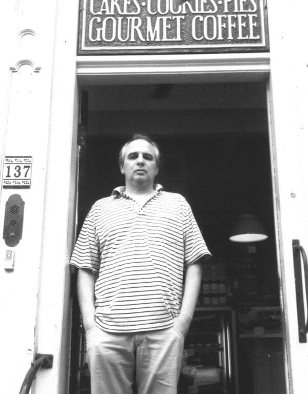 Guillermo Mellicovsky outside the original shop in Amsterdam
